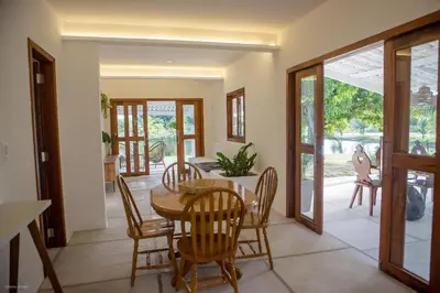 Uma área de estar em Casa Blue Parrot – Um Paraíso na Praia da Taíba