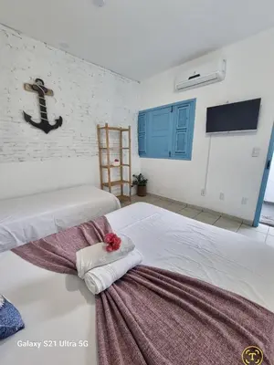 Uma cama ou camas num quarto em Pousada Lua de Jeri