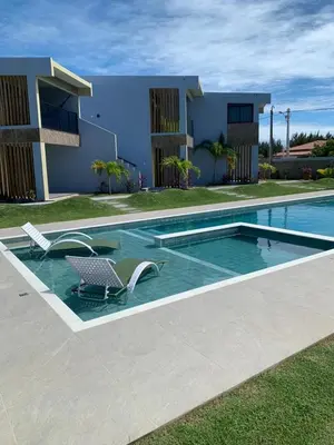 A piscina em ou perto de CHEZ TUPÃ SUÍTES
