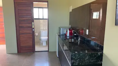 A cozinha ou kitchenette de CHEZ TUPÃ SUÍTES