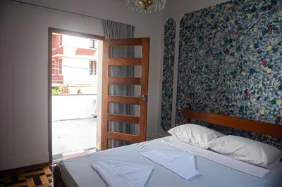 Uma cama ou camas num quarto em Hotel pousada Krone Praia de Iracema Fortaleza