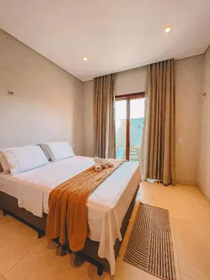 Uma cama ou camas num quarto em Casa Bella - Praia do Preá-CE