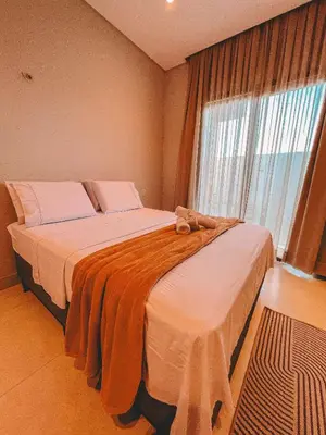 Uma cama ou camas num quarto em Casa Bella - Praia do Preá-CE