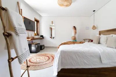 Uma cama ou camas num quarto em Villa Odara