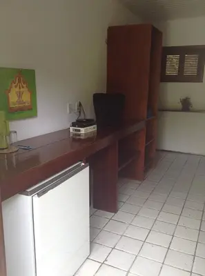 A cozinha ou kitchenette de Chalé das Helicôneas - Suítes