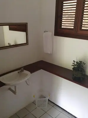Uma casa de banho em Chalé das Helicôneas - Suítes