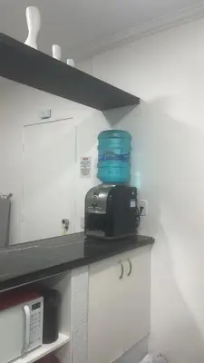 A cozinha ou kitchenette de Newlife Residence