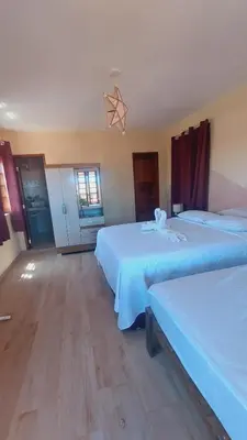 Uma cama ou camas num quarto em Espaço conforto e tranquilidade CASAVEG