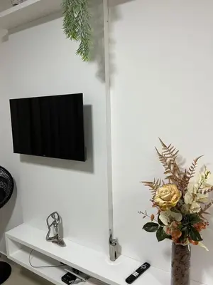 Uma televisão e/ou sistema de entretenimento em Seller Residence Centro
