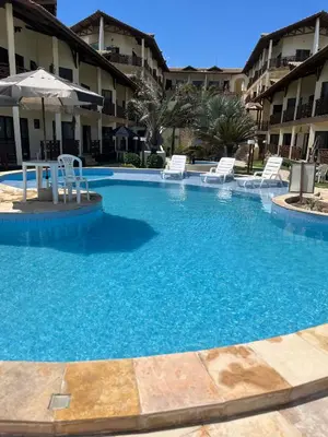 A piscina em ou perto de Apto 2 quartos - Condomínio Frente Mar