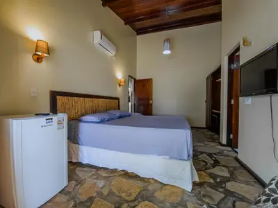 Uma cama ou camas num quarto em Sunset Beach Villas