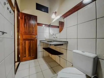 Uma casa de banho em Sunset Beach Villas