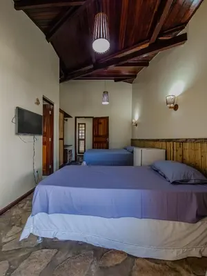 Uma cama ou camas num quarto em Sunset Beach Villas