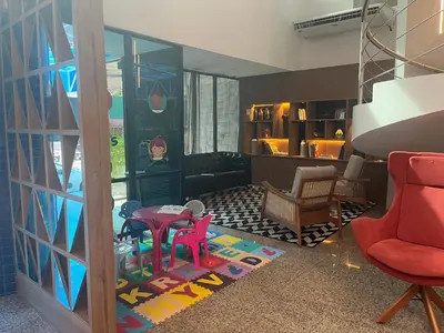 Uma área de estar em Flat Fortaleza Meireles