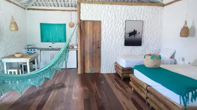 Uma cama ou camas num quarto em Villa Água Viva