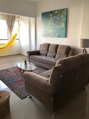 Uma área de estar em Cozy apartment by the ocean