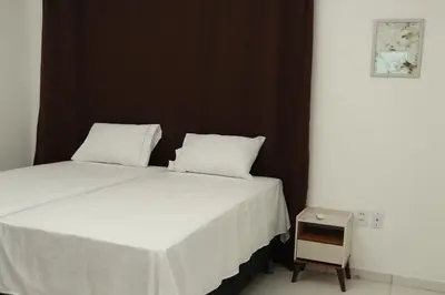 Uma cama ou camas num quarto em Apartamentos Cumbuco Condomínio Vila Real
