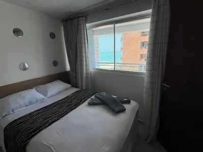 Uma cama ou camas num quarto em Lindo Ap vista mar em Beach Class Fortaleza