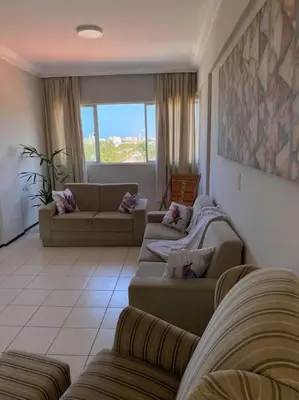 Uma área de estar em Apartamento Praia do Futuro, 4qtos,300ms da praia
