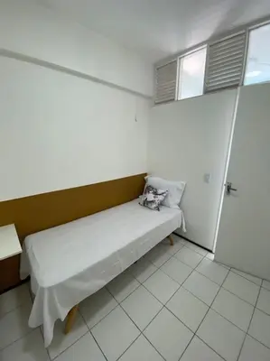 Uma cama ou camas num quarto em Apartamento Praia do Futuro, 4qtos,300ms da praia