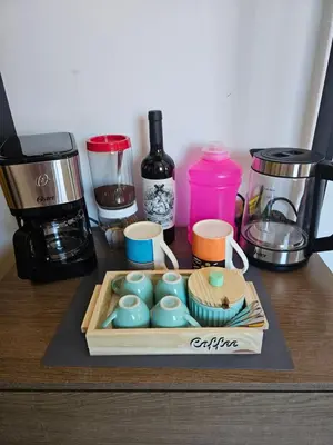 Comodidades para chá e café em B&B Pousada Swiss Residence