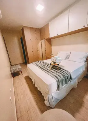 Uma cama ou camas num quarto em Ap Mary e Max - Cumbuco