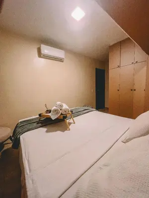 Uma cama ou camas num quarto em Ap Mary e Max - Cumbuco