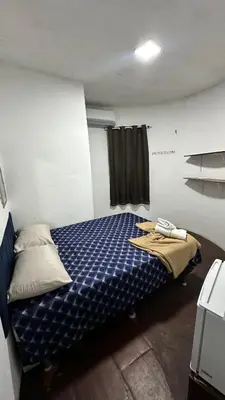 Uma cama ou camas num quarto em Pousada Capitólio 04 Canoa Quebrada