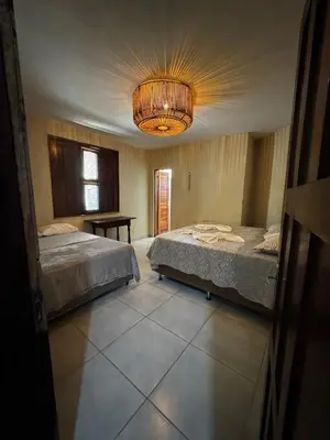 Uma cama ou camas num quarto em Sítio riacho fundo