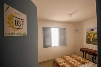 Uma cama ou camas num quarto em Tranquilidade e Conforto em Guaramiranga
