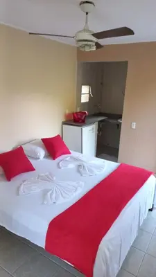 Uma cama ou camas num quarto em Pousada Rota Do Beija Flor PACOTI-CE