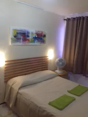 Uma cama ou camas num quarto em Apartamento Praia de Iracema