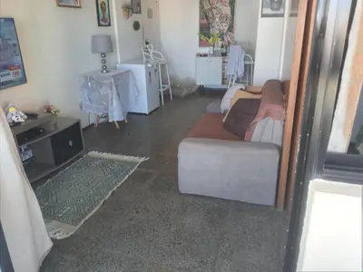 Uma área de estar em Flat via venetto ap 1501