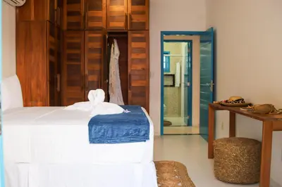 Uma cama ou camas num quarto em Vila Marinella