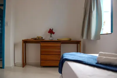 Uma cama ou camas num quarto em Vila Marinella