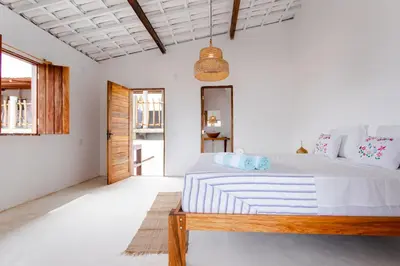 Uma cama ou camas num quarto em Casa na Praia Preá - Casa Inteira