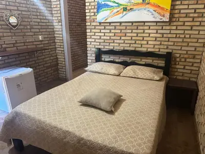 Uma cama ou camas num quarto em Casa De Praia 9 quartos Em Aguas Belas, CE