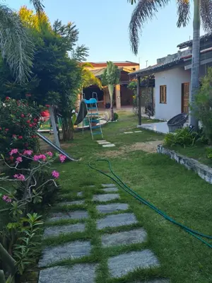 Um jardim no exterior de Casa De Praia 9 quartos Em Aguas Belas, CE