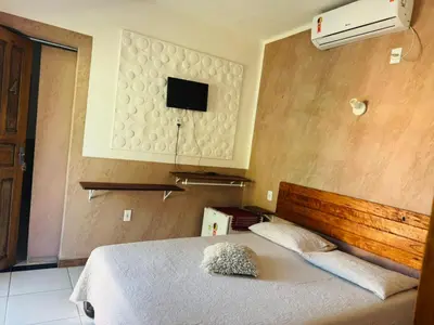 Uma cama ou camas num quarto em Casa De Praia 9 quartos Em Aguas Belas, CE