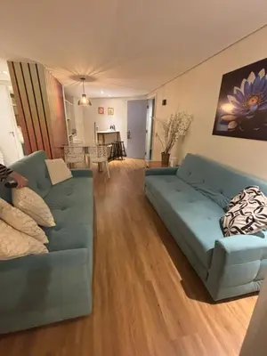 Uma área de estar em Flat 912 - Iate Plaza Hotel