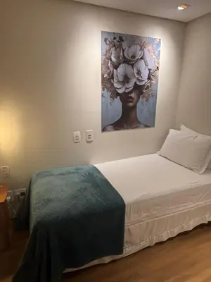Uma cama ou camas num quarto em Flat 912 - Iate Plaza Hotel