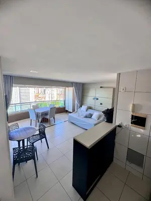 Uma cama ou camas num quarto em Studio Iracema 2001
