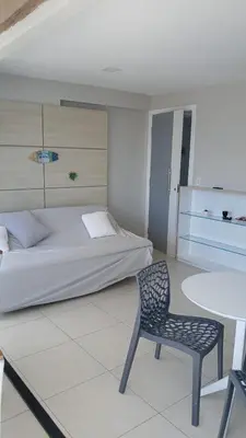 Uma cama ou camas num quarto em Studio Iracema 2001
