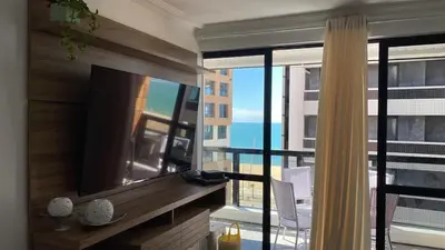 Uma televisão e/ou sistema de entretenimento em Apartamento Atlântico