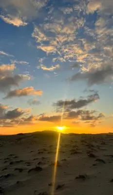 O nascer ou o pôr do sol visto a partir do apartamento