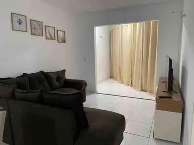 Uma televisão e/ou sistema de entretenimento em Apto com Ar com vista para praia de Morro Branco - Fortaleza