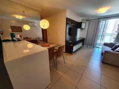 Uma televisão e/ou sistema de entretenimento em Ed Terraço Atlantico 1011 lateral vista mar