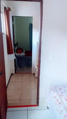Uma cama ou camas num quarto em Chalé Sitio Miranda Sra Solange