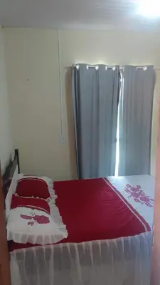 Uma cama ou camas num quarto em Chalé Sitio Miranda Sra Solange