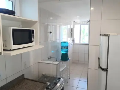 A cozinha ou kitchenette de Apartamento Porto Beach Residence